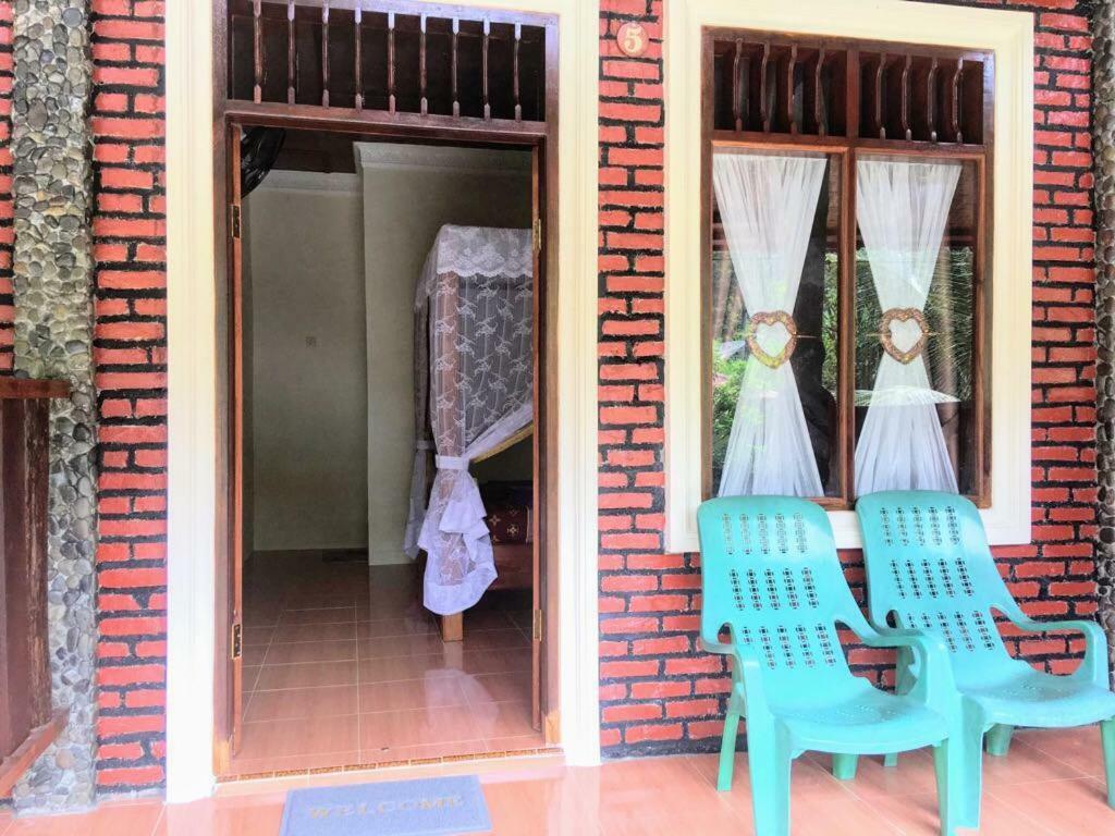 Sahnan Guest House Bukit Lawang Exterior foto